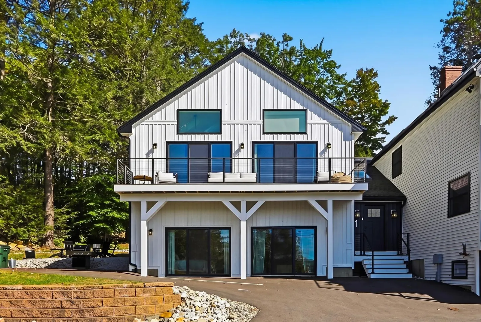 Residence exterior — planned sliding-door renovation (edited image)